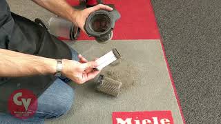 How to Empty the Dirt Cup on the Miele TriFlex [upl. by Nywrad]