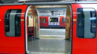 Central Line train doors open both sides [upl. by Delaryd426]